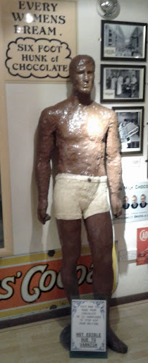 Life size, six foot tall chocolate man, on display at Walkers Chocolate Emporium.